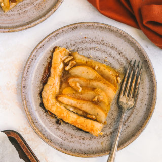 a piece of pear tart on a plate