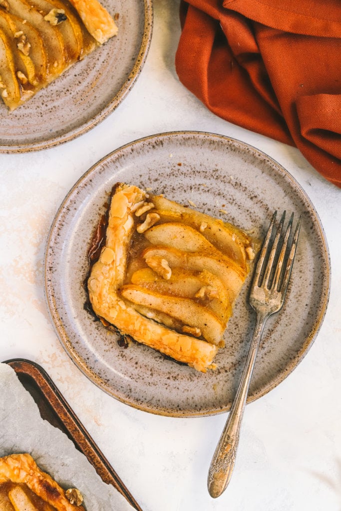 a piece of pear tart on a plate