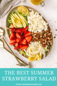 strawberries, avocado, feta, almonds and lettuce on a plate