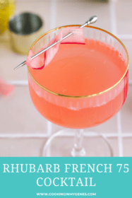 a rhubarb french 75 in a coupe glass with a rhubarb garnish