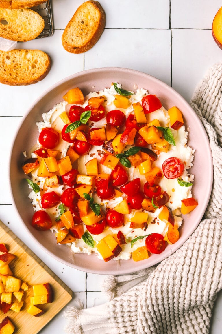 peaches and tomatoes with goat cheese served on crostini