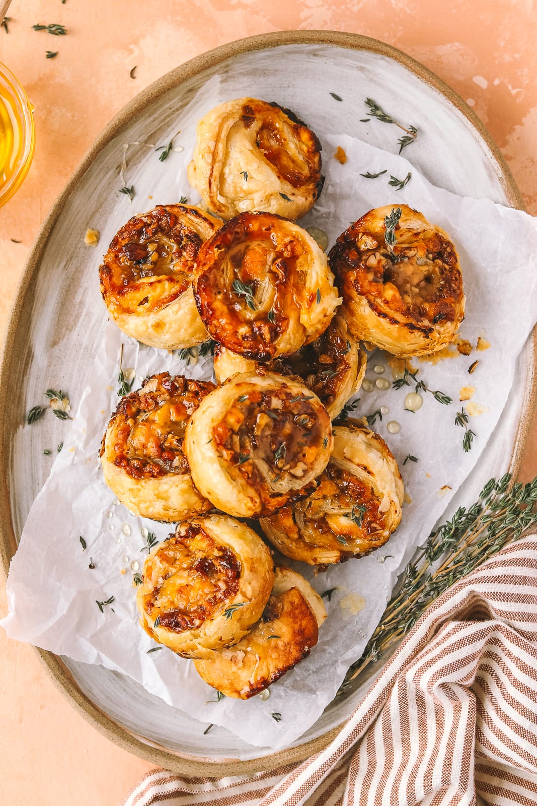 plate of closeup of a goat cheese and apricot jam pinwheel appetizers
