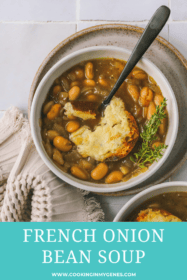 top view of french onion soup with cheesy toast and spoon