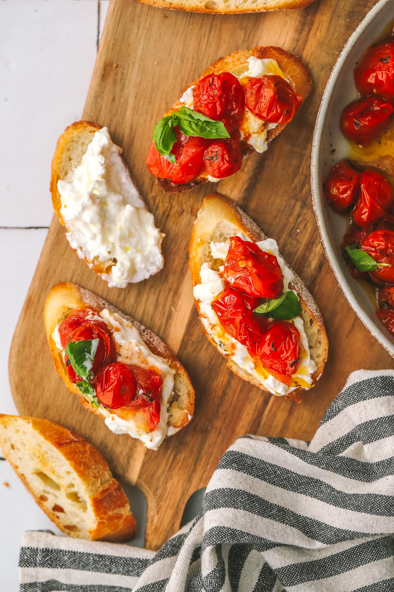 burrata bread appetizer on a serving tray