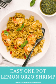 white bowl with orzo, cooked shrimp and side of pesto