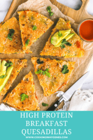 breakfast quesadilla cut up on a platter with avocado