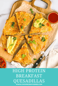 breakfast quesadilla cut up on a platter with avocado