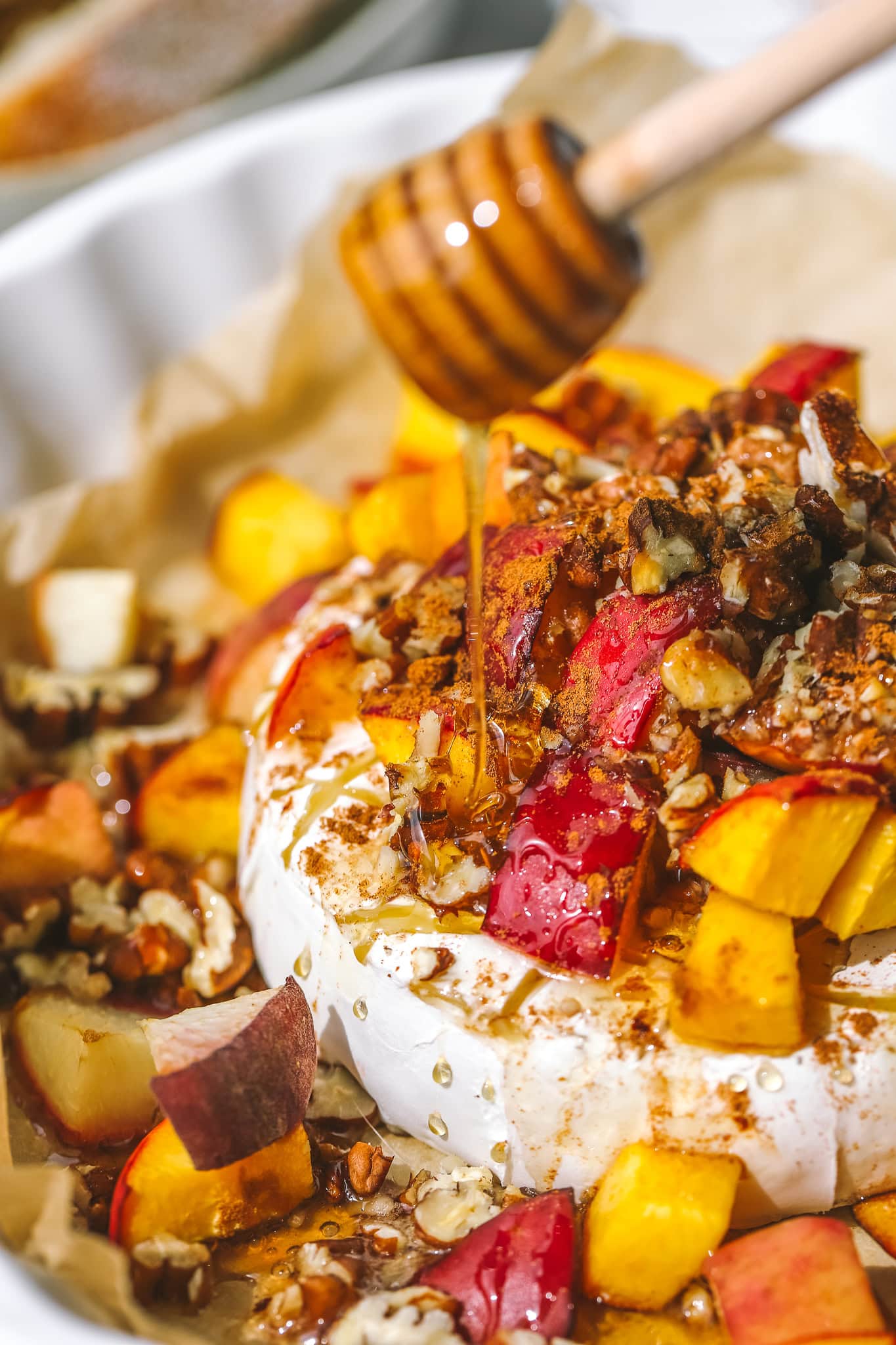 drizzling honey on brie