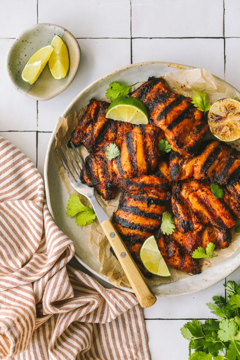 chili lime chicken thighs on a serving platter