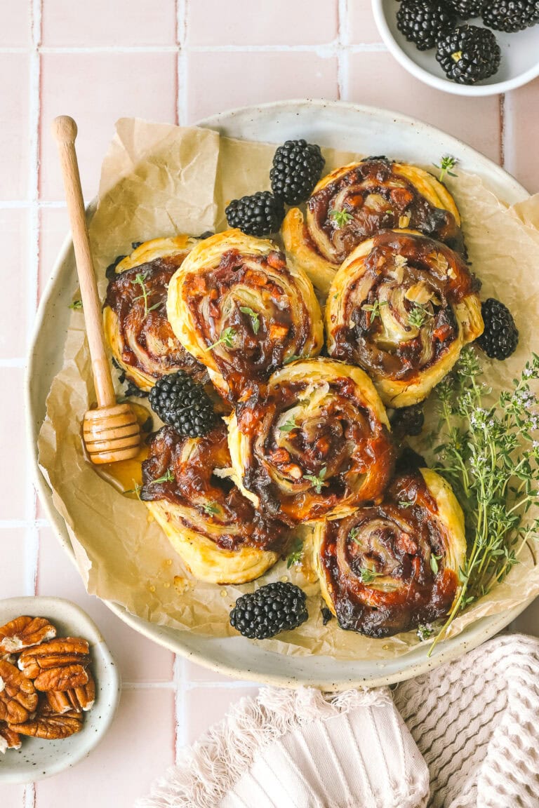 blackberry puff pastry pinwheels on a plate