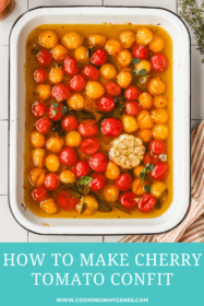 confit tomatoes in a baking dish with garlic and herbs