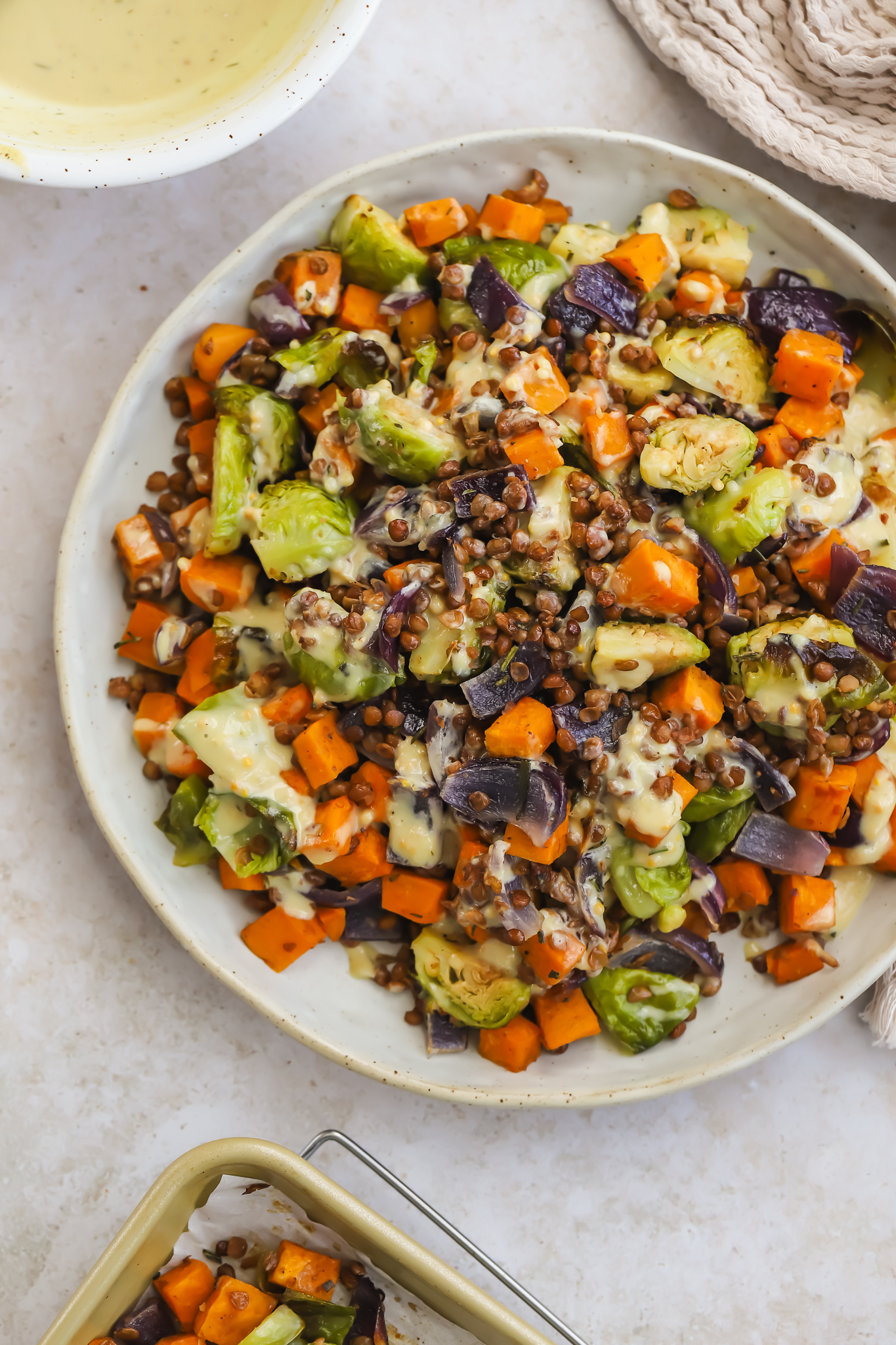 overhead of warm lentil salad in a bowl