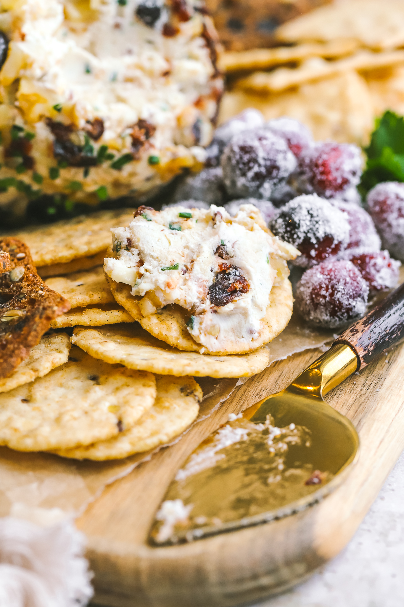 cheese ball slice on a cracker