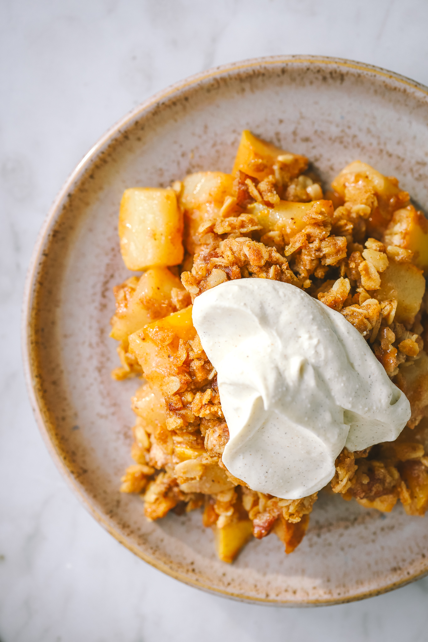 overhead shot of pear crisp on a plate