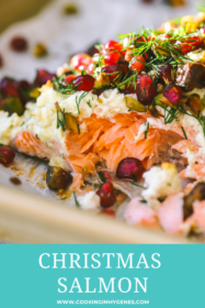 close up of baked salmon with pomegranate seeds, dill and pistachios