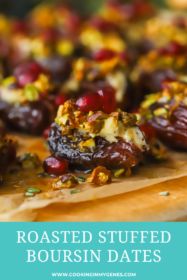 stuffed date on a serving tray with pistachios and pomegranate seeds