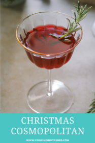 angled shot Christmas cosmopolitan in a coupe glass