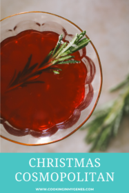 close up of rosemary garnish in a cosmopolitan cocktail