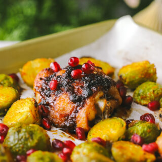 angled shot of pomegranate chicken