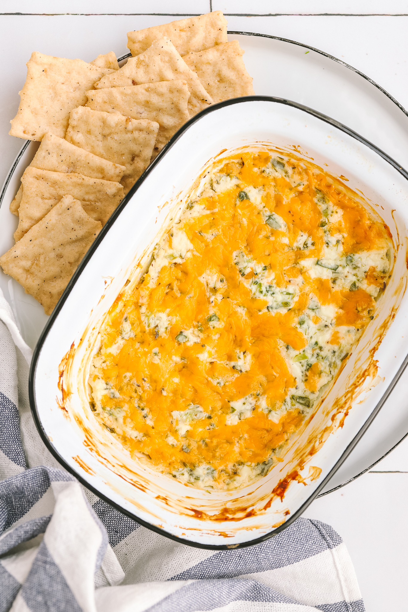 hot broccoli cheese dip in a single serving baking dish