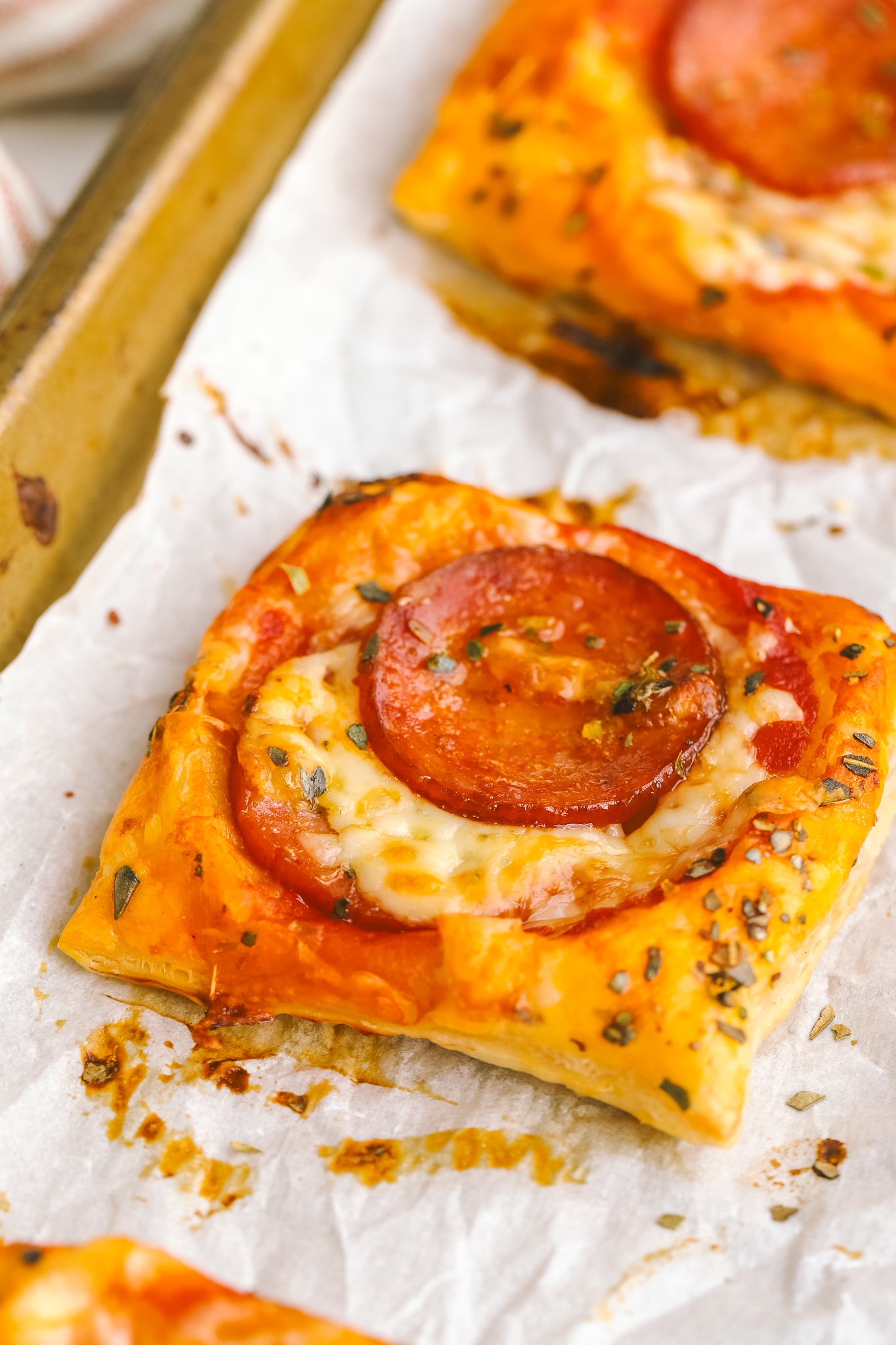 angled shot of puff pastry pizza tart