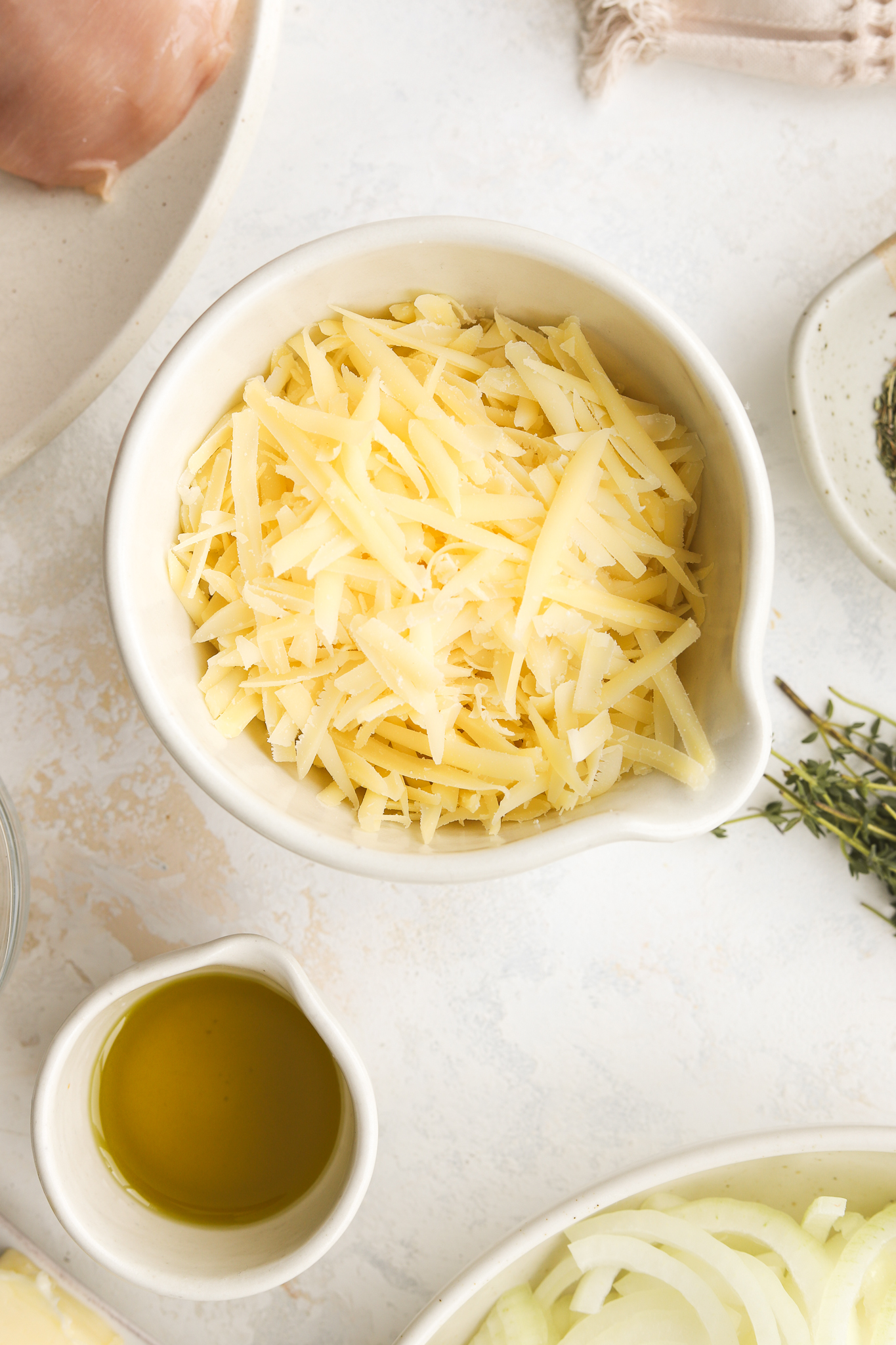 shredded gruyere cheese in a bowl