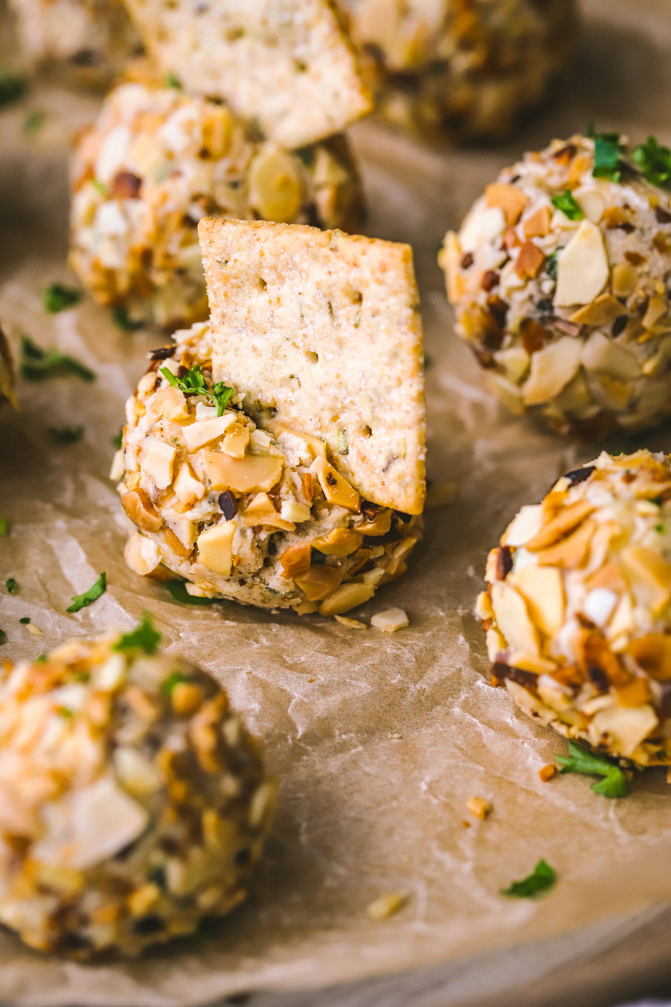 mini cheese ball with a cracker in it