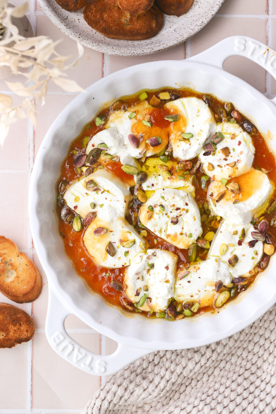 baked goat cheese in a baking dish