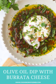 overhead of burrata in olive oil dip