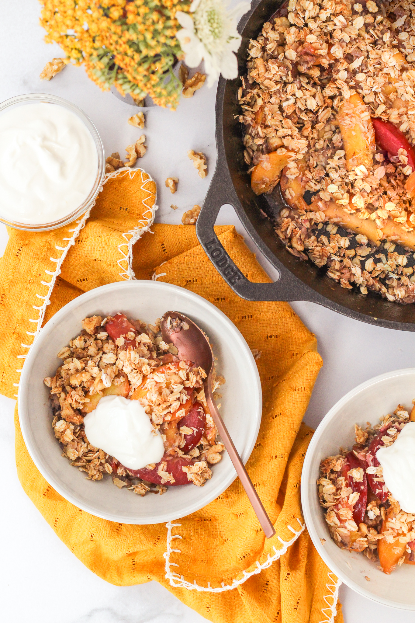 peach and plum breakfast crumble in a bowl 