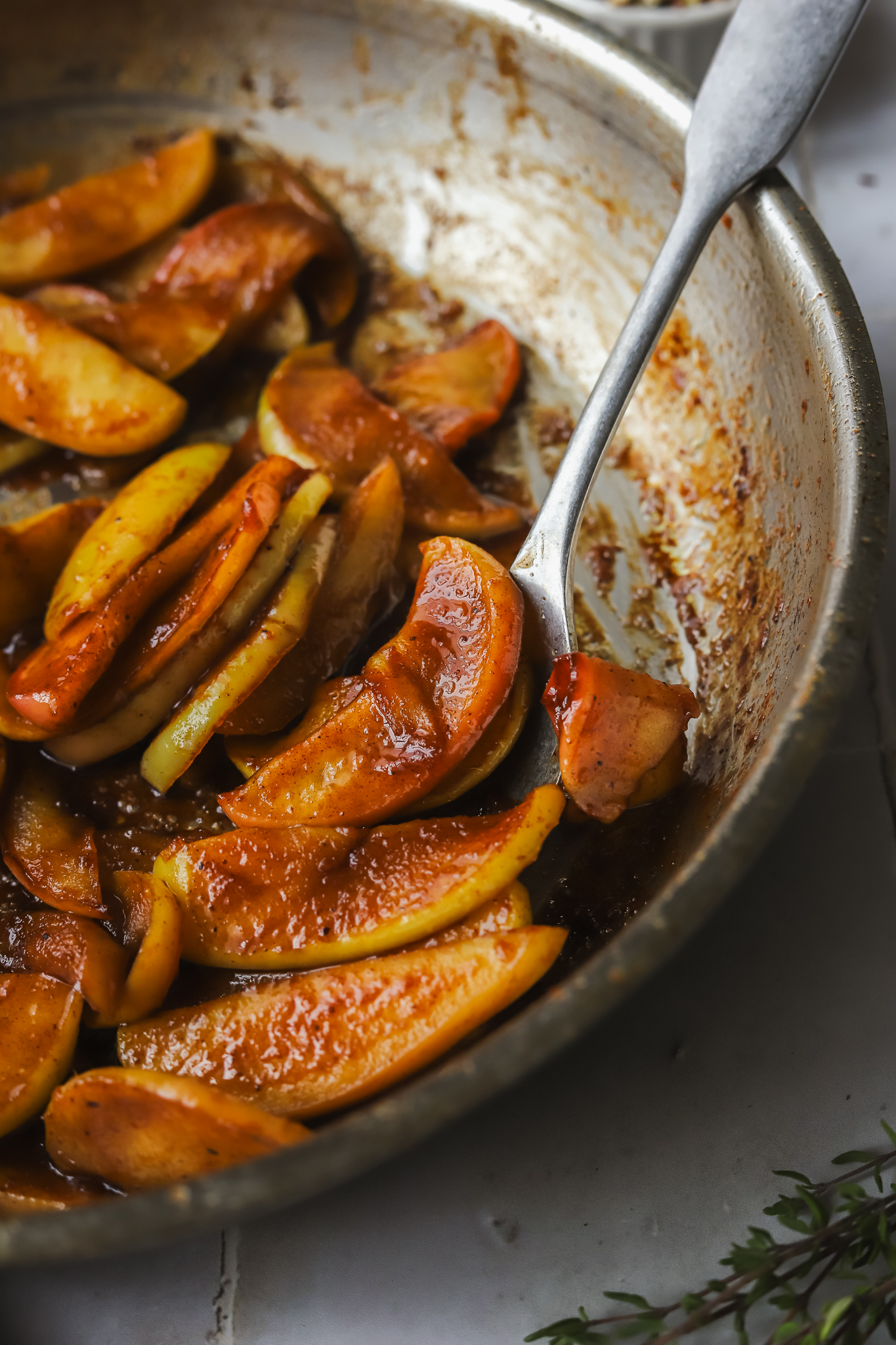 cooked cinnamon apples in a pan