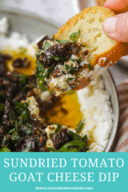 crostini dipped into marinated goat cheese dip