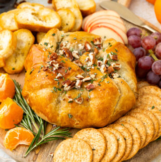 Puff Pastry Baked Brie with Fig Jam Appetizer on a serving board