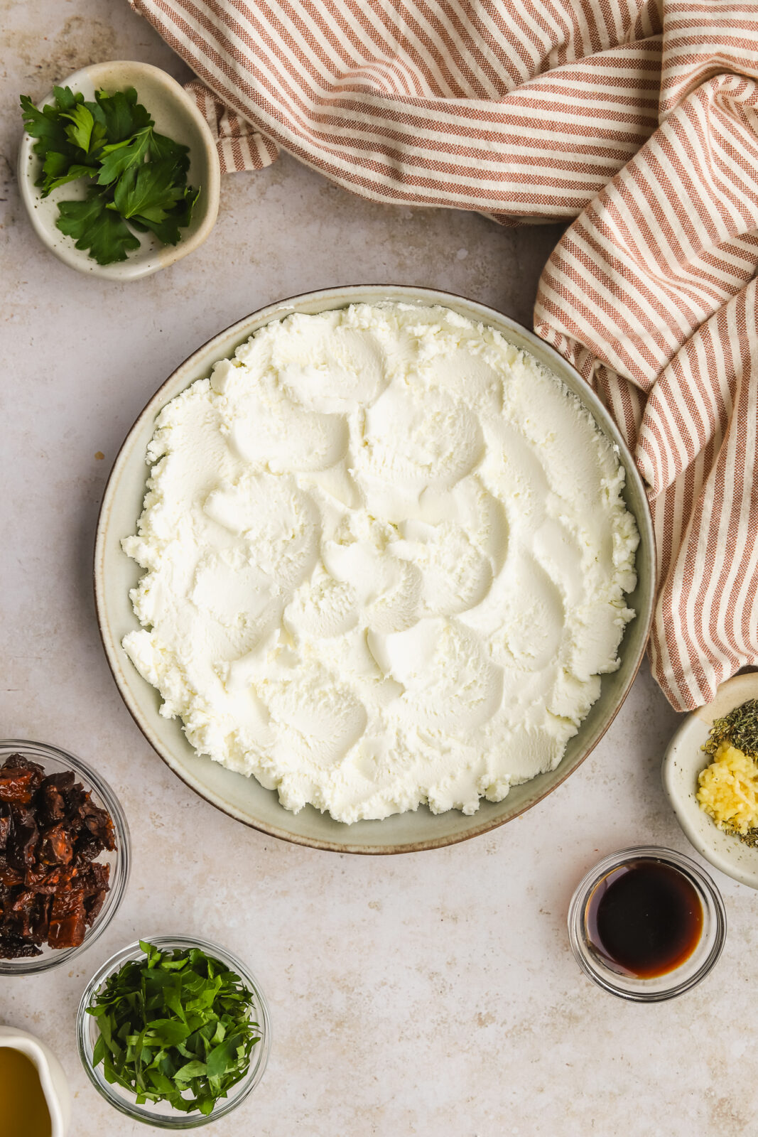 goat cheese spread in a low bowl