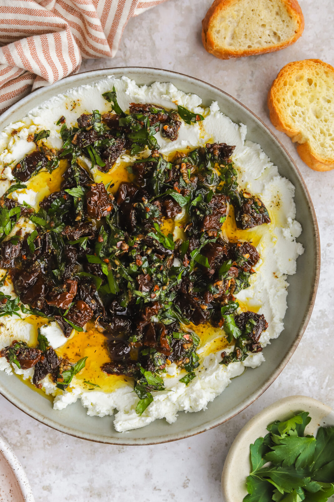 goat cheese marinated with sundried tomatoes, fresh herbs and olive oil