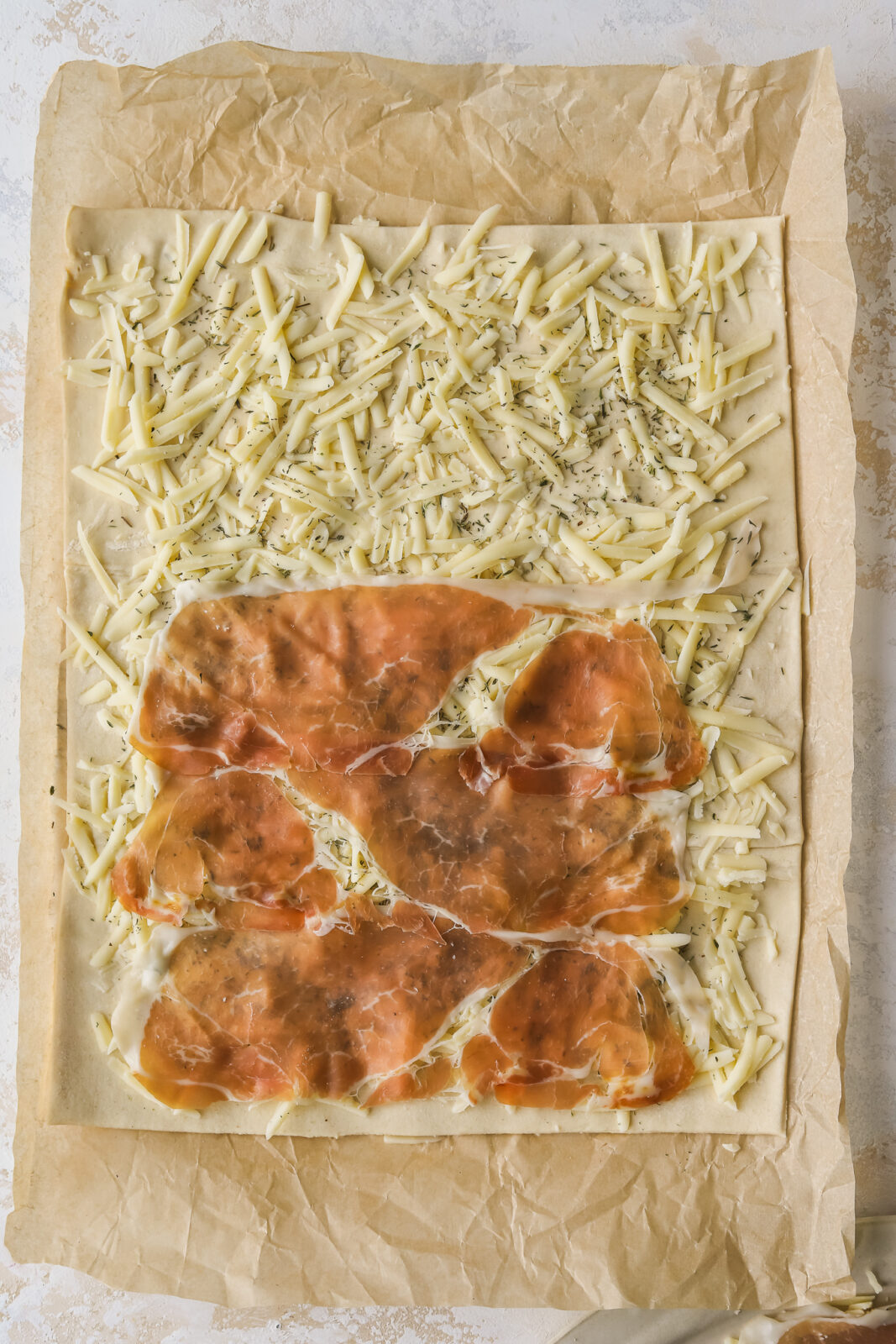 puff pastry layered with gruyere cheese and prosciutto