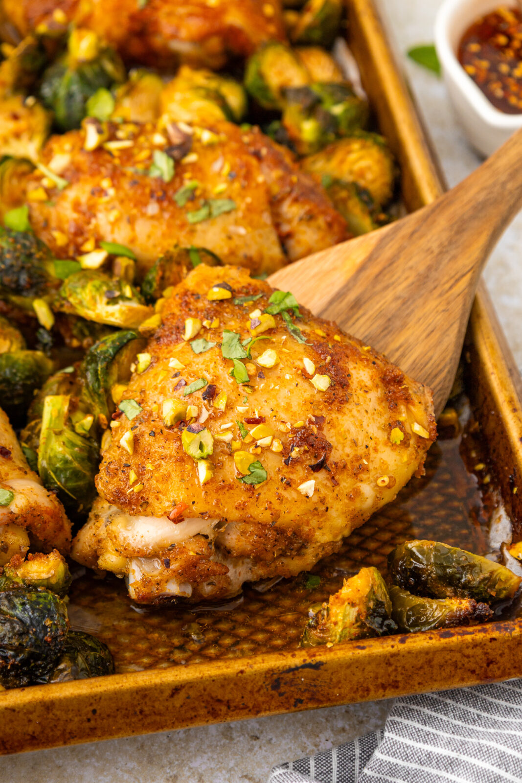 hot honey chicken on a serving spoon