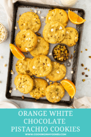 orange white chocolate pistachio cookies on a baking tray