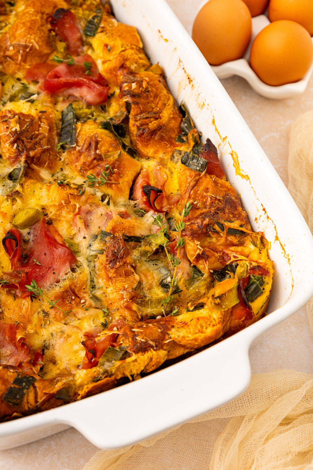close up of breakfast casserole in baking dish