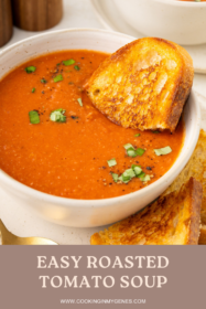 toast dipped into a bowl of tomato soup