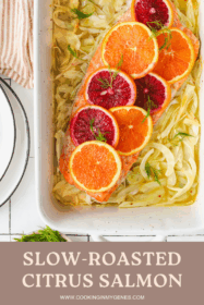 salmon topped with citrus in a baking dish with fennel