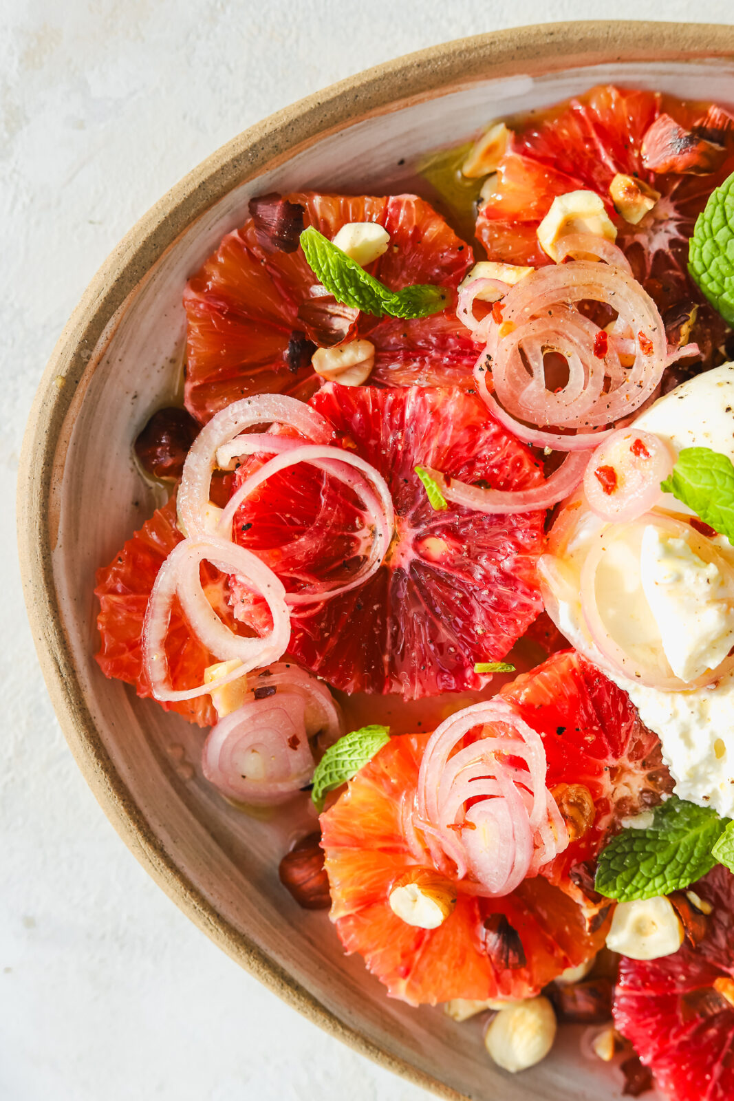 blood oranges with shallots, mint and hazelnuts