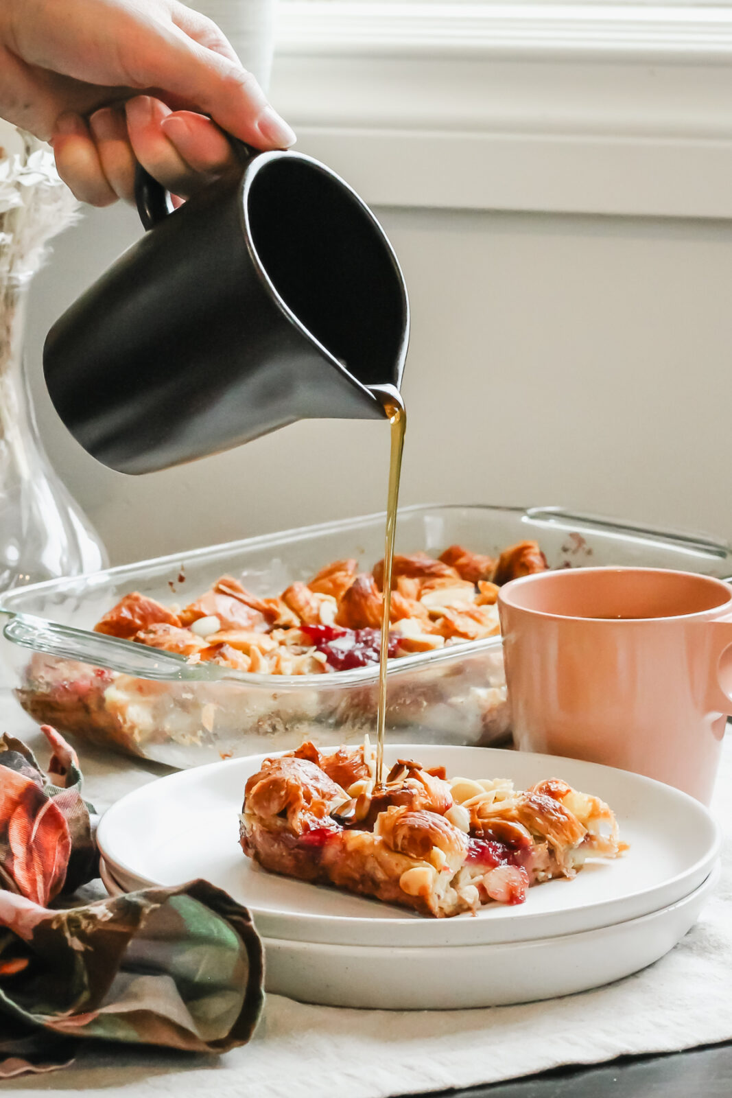syrup pouring on piece of french toast