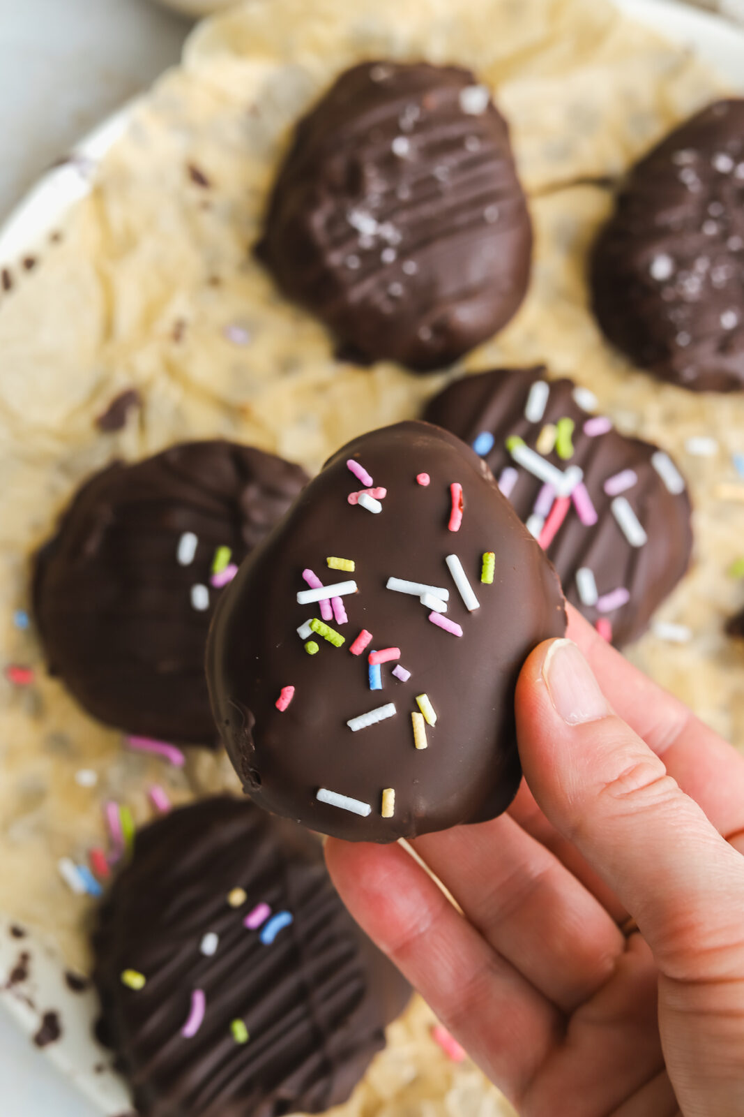 hand holding peanut butter egg