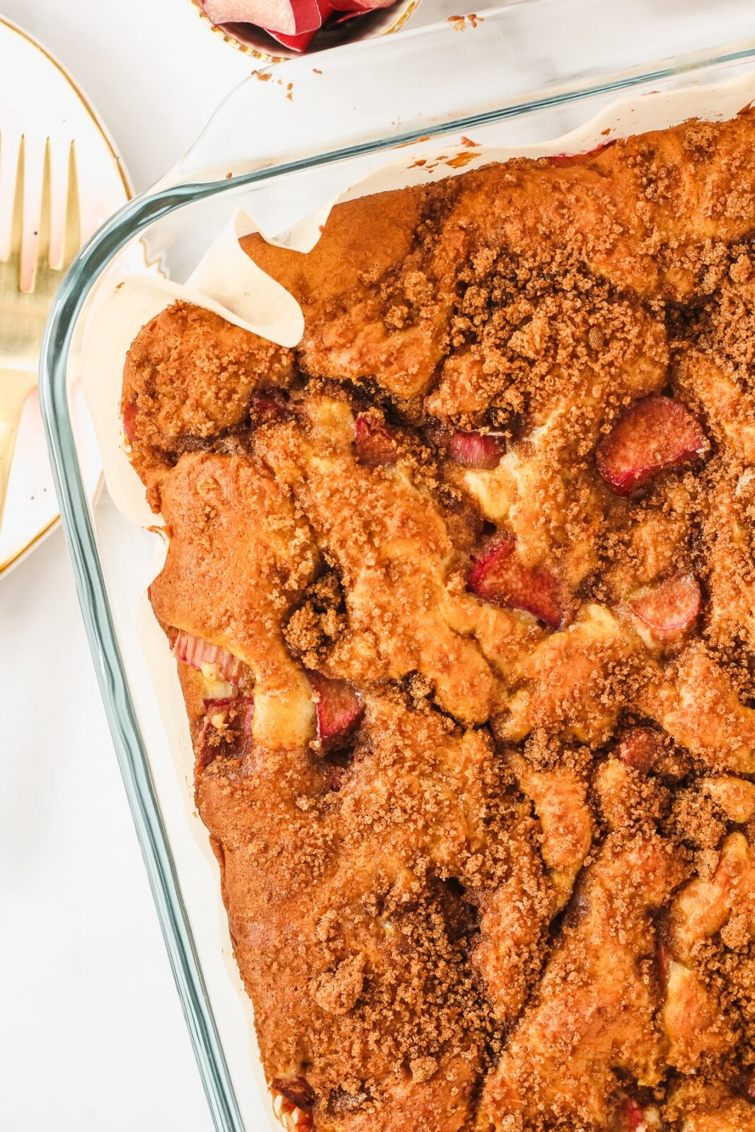 rhubarb coffee cake with crumb topping in a baking pan